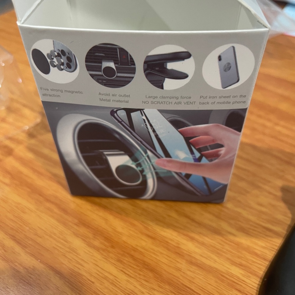 New car phone holder, open box never used, 1 piece